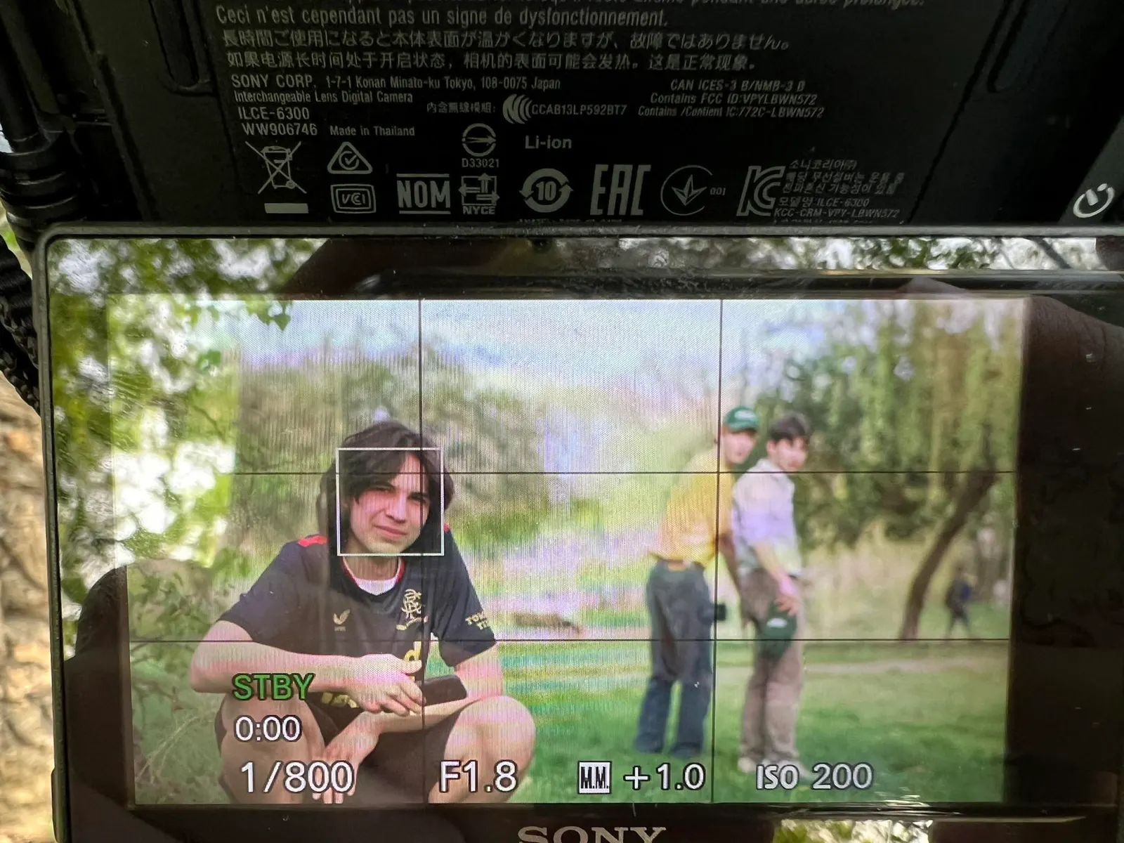 Filming video content with a camera in a park