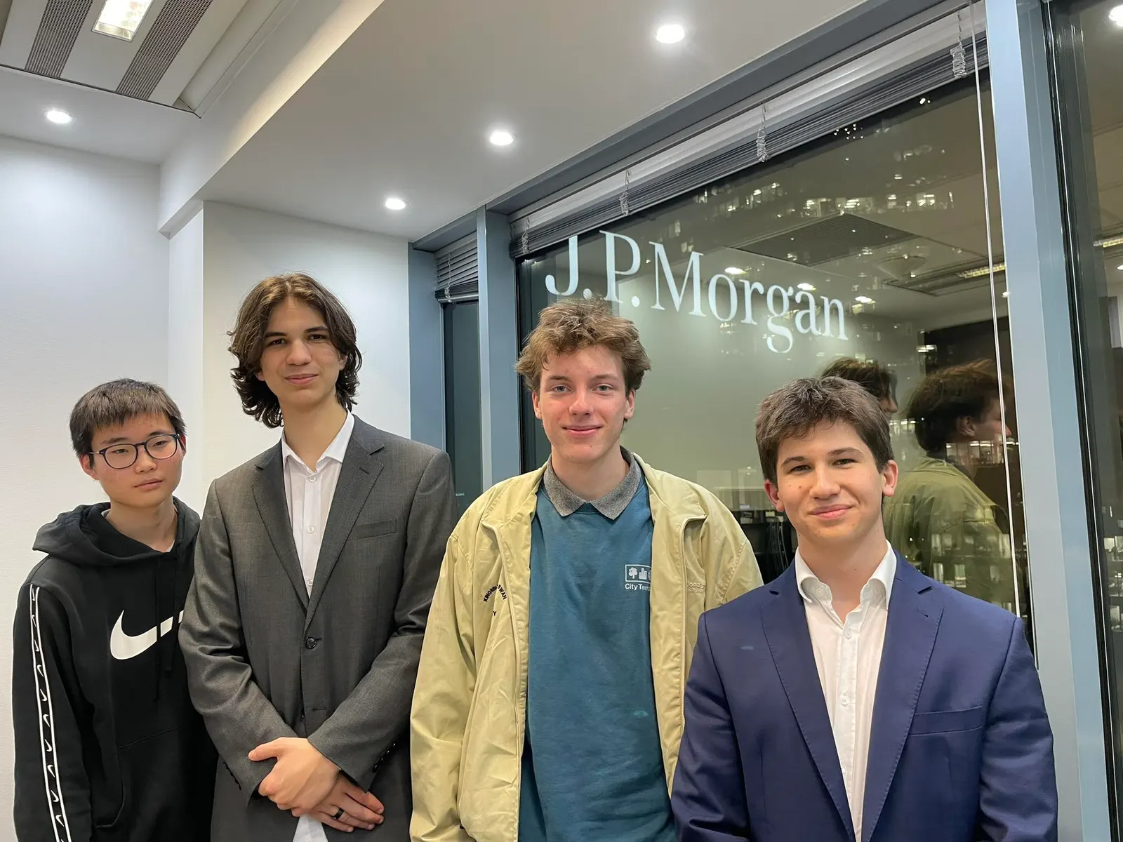 The team in front of the J.P. Morgan office
